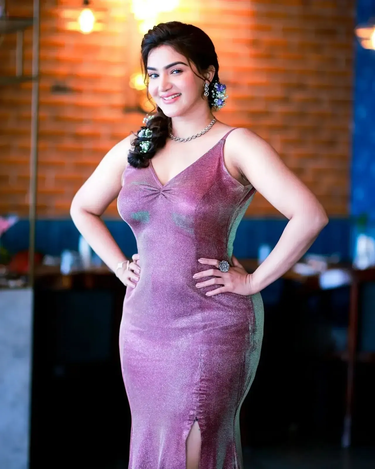 south indian actress honey rose in sleeveless long pink gown